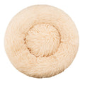 Beige calming dog bed with raised rim, top view showing plush faux fur